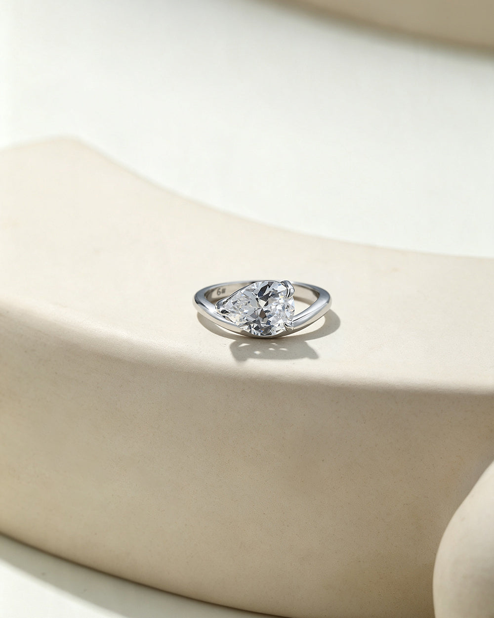 Rhodium Plated Water Drop Twist CZ Ring