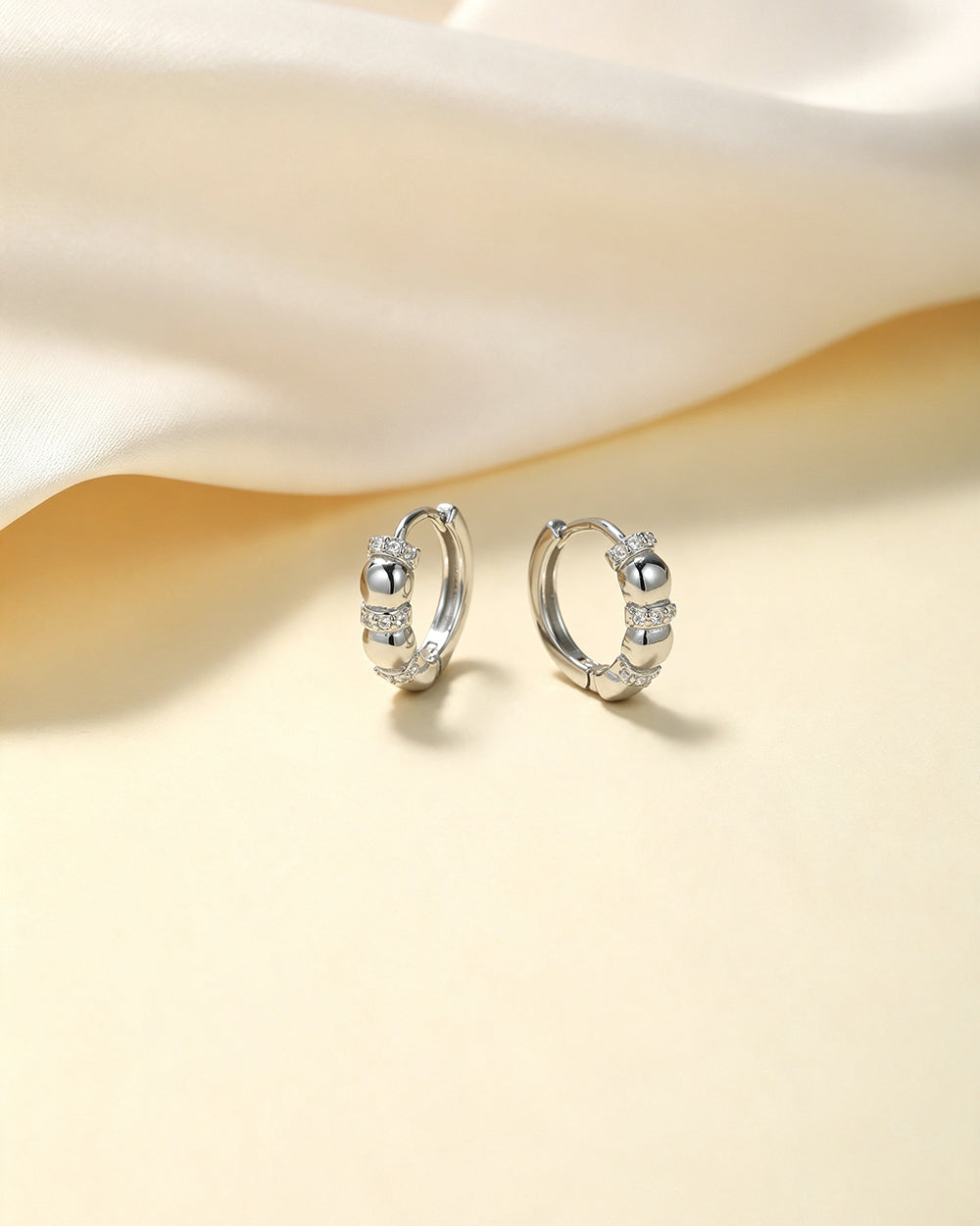 Orbit Huggies Hoop Earrings