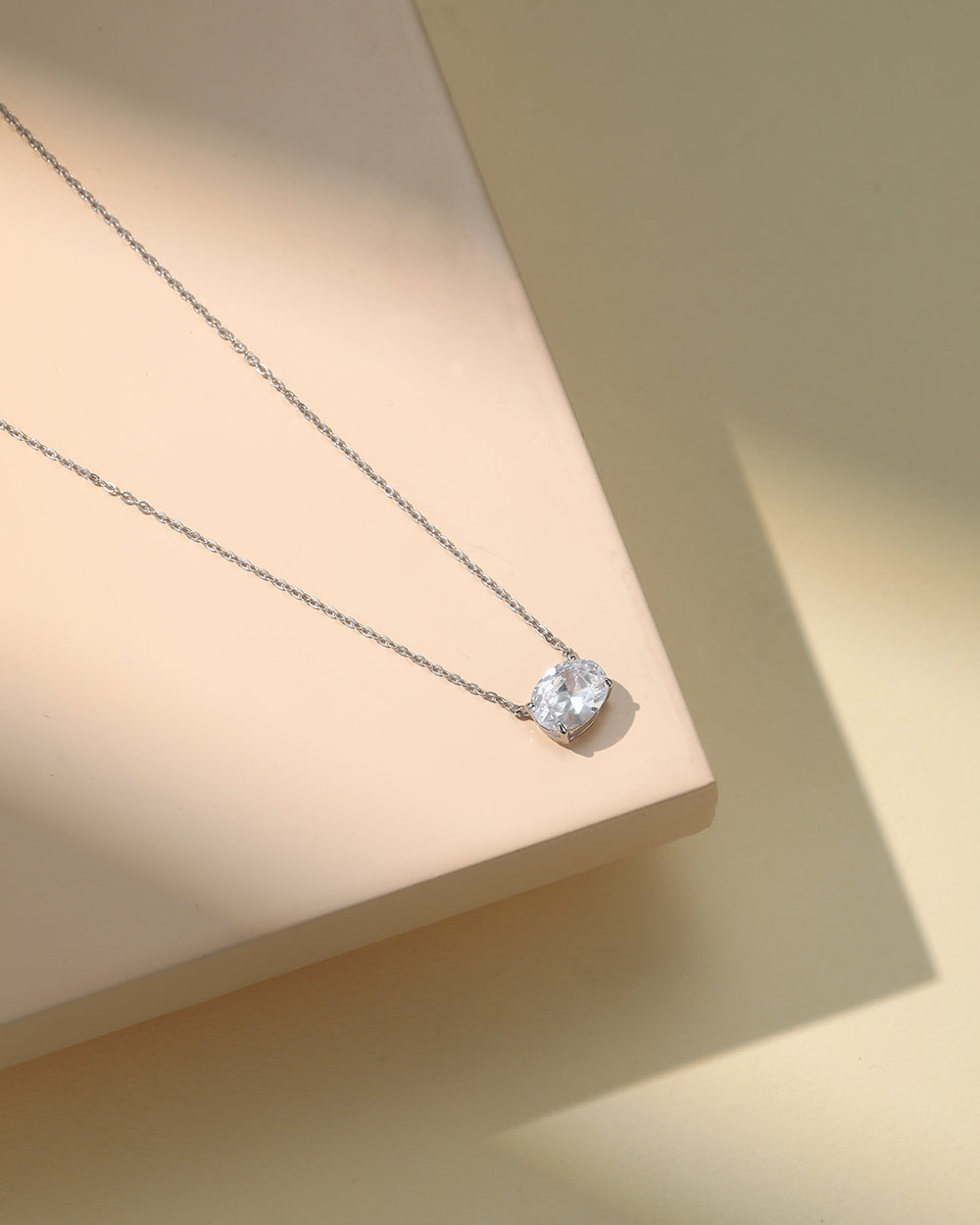 Rhodium Plated Oval CZ Pendant Necklace