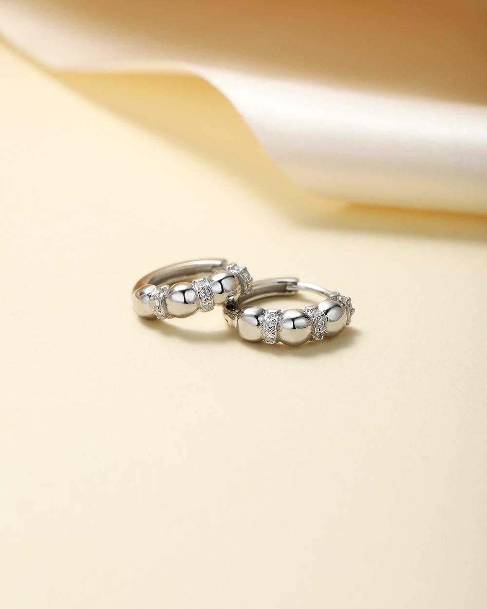 Orbit Huggies Hoop Earrings