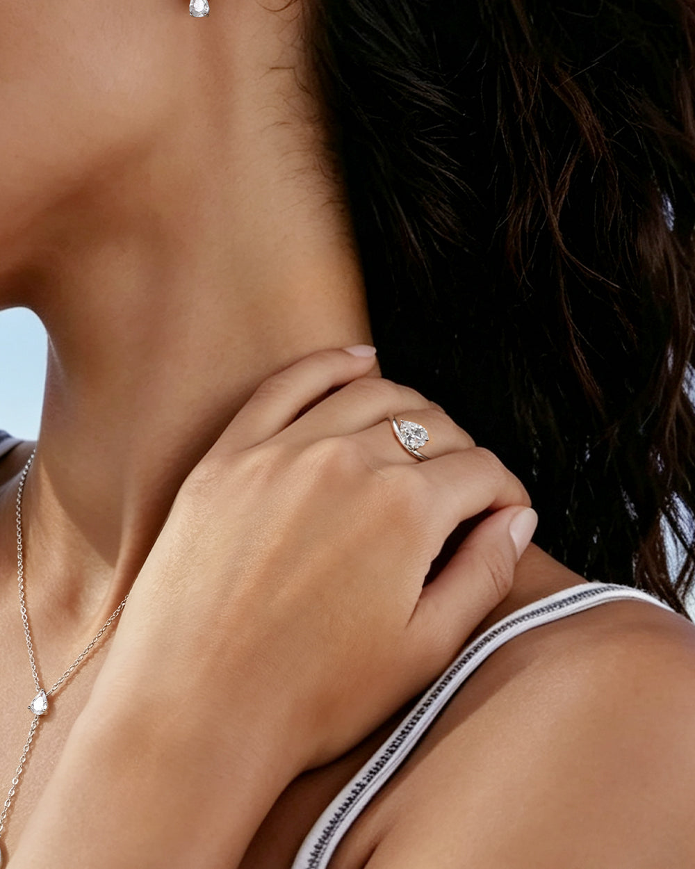 Rhodium Plated Water Drop Twist CZ Ring